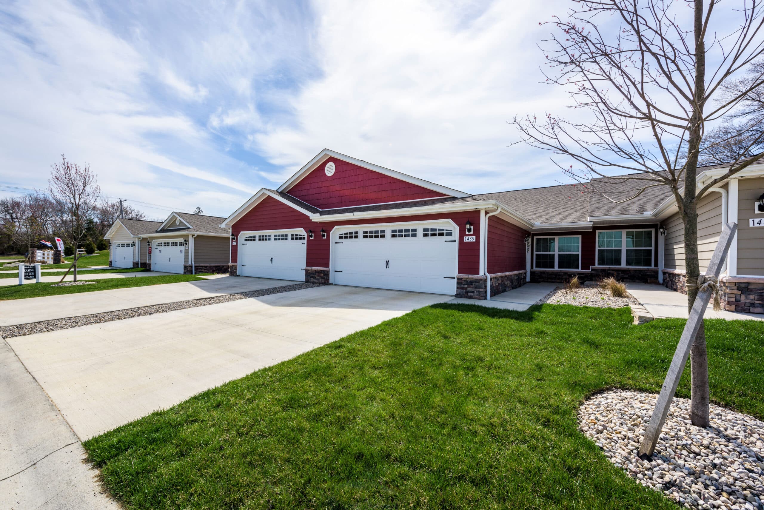 A red home with a mowed lawn in Lebanon, Ohio.